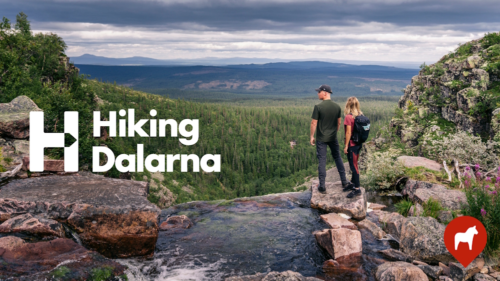 Hiking Dalarna logo och ett par som står vid Njupeskär.