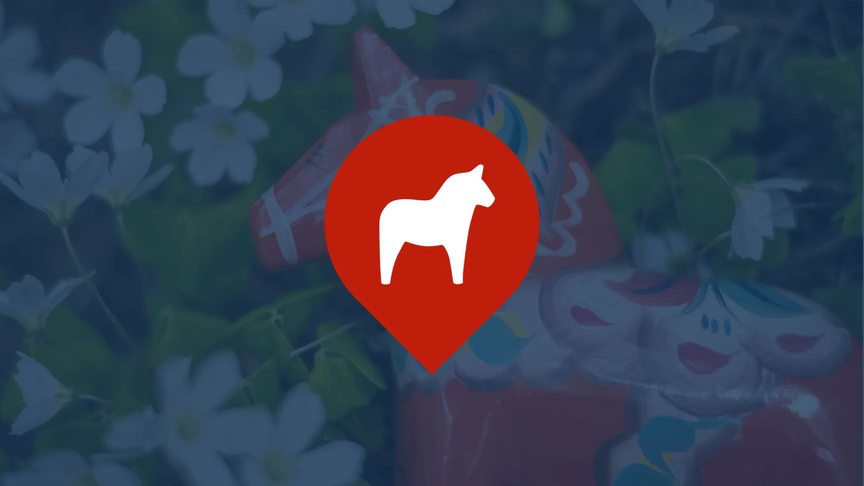 Poi med en Dalahäst i.