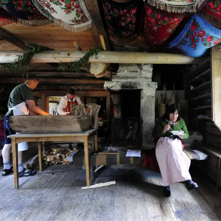 Three persons in Evertsberg old farm house