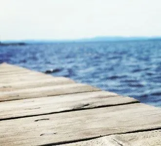 Pier with water behind.